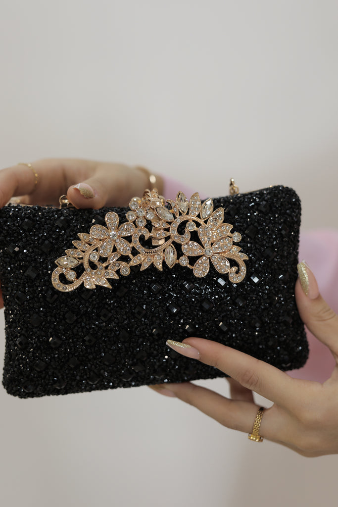 Schwarze Eleganz mit Goldakzenten Tasche