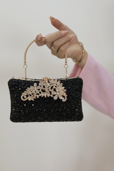 Schwarze Eleganz mit Goldakzenten Tasche